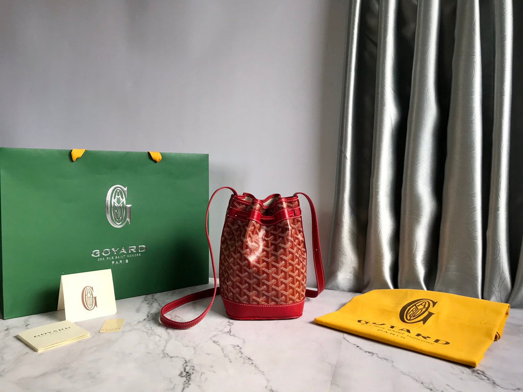 GOYARD PETIT FLOT BUCKET BAG 22 IN CLASSIC RED GOYARDINE CANVAS AND LAMBSKIN TRIM