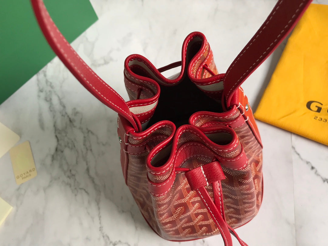 GOYARD PETIT FLOT BUCKET BAG 22 IN CLASSIC RED GOYARDINE CANVAS AND LAMBSKIN TRIM