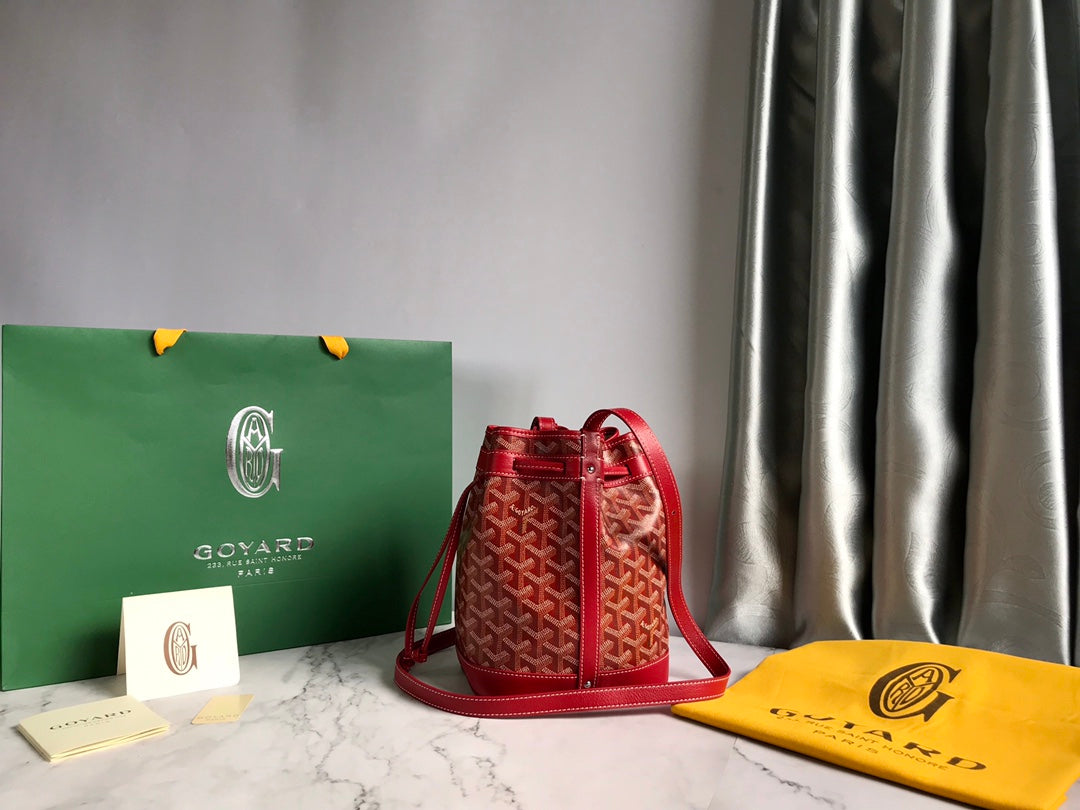 GOYARD PETIT FLOT BUCKET BAG 22 IN CLASSIC RED GOYARDINE CANVAS AND LAMBSKIN TRIM