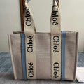 CHLOE MEDIUM STRAP WOODY TOTE BAG 37 IN BEIGE LINEN CANVAS BLACK WEBBING LOGO EMBROIDER BLUE CALFSKIN