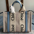 CHLOE SMALL STRAP WOODY TOTE BAG 26.5 IN BEIGE LINEN CANVAS BLACK WEBBING LOGO EMBROIDER BLUE CALFSKIN