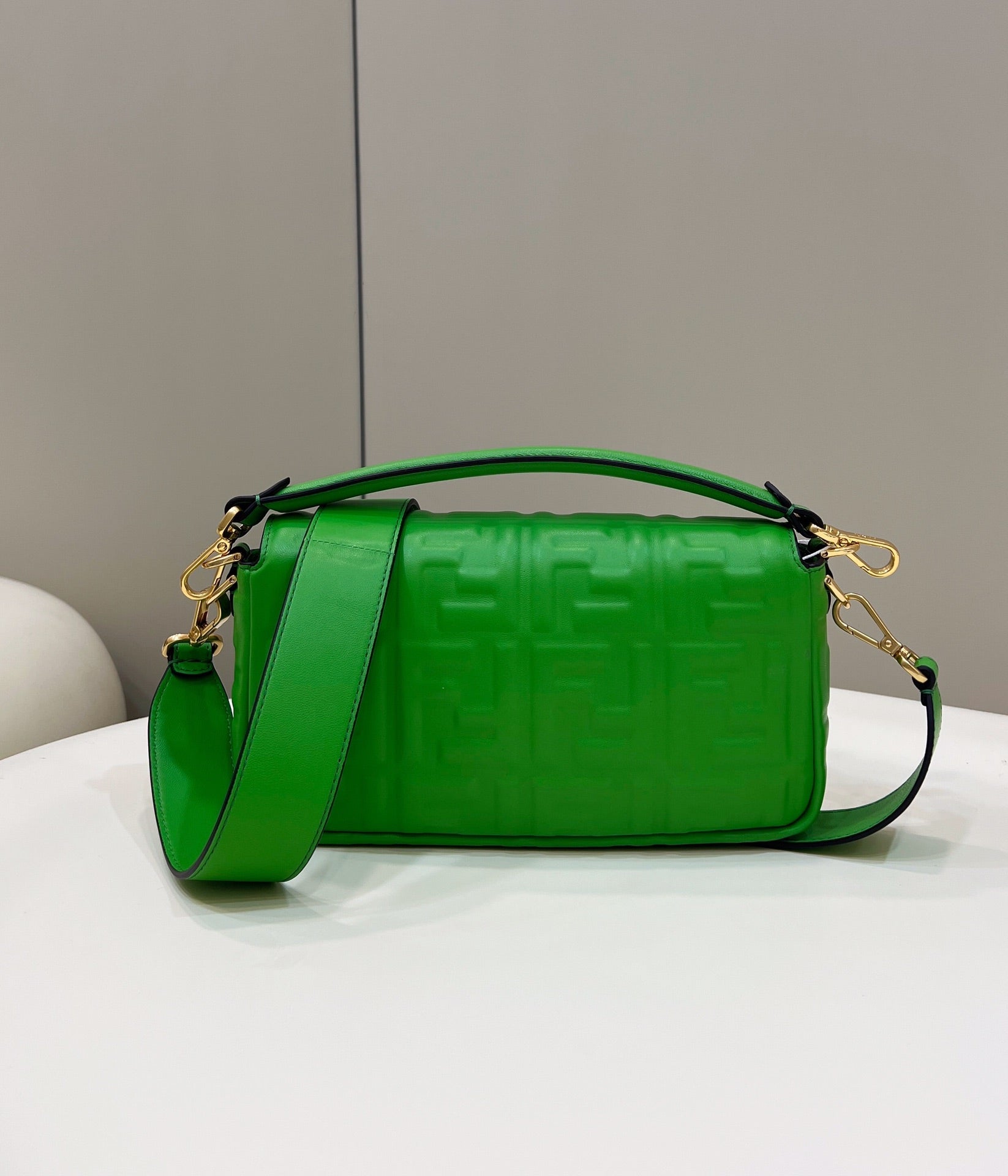 FENDI BAGUETTE WITH FF MOTIF 27 IN EMERALD GREEN SOFT LAMBSKIN GOLD HARDWARE