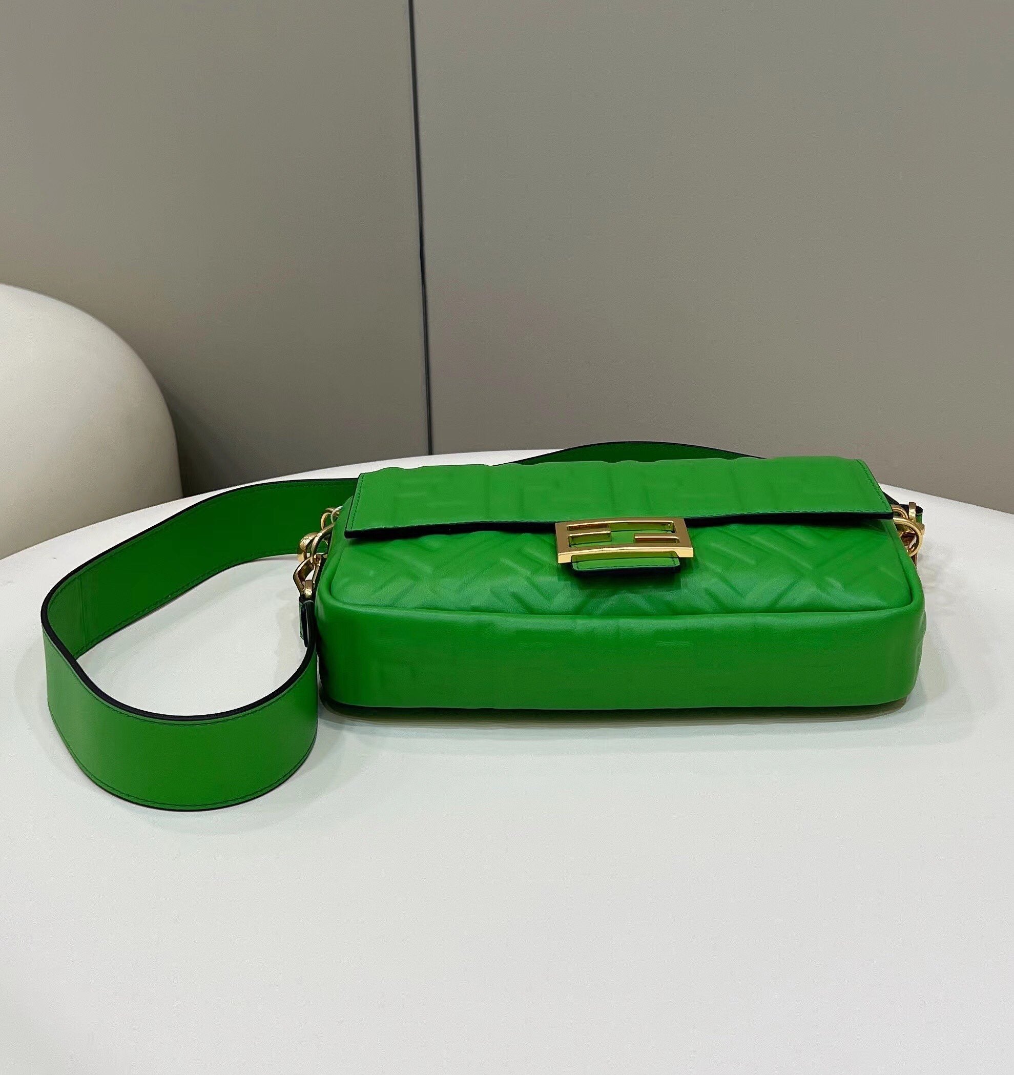 FENDI BAGUETTE WITH FF MOTIF 27 IN EMERALD GREEN SOFT LAMBSKIN GOLD HARDWARE