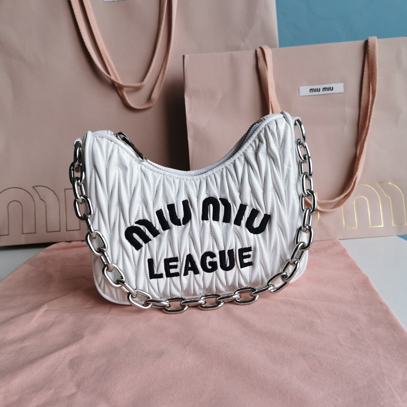 MIU MIU MATELASSé 21 BAG IN WHITE SATIN