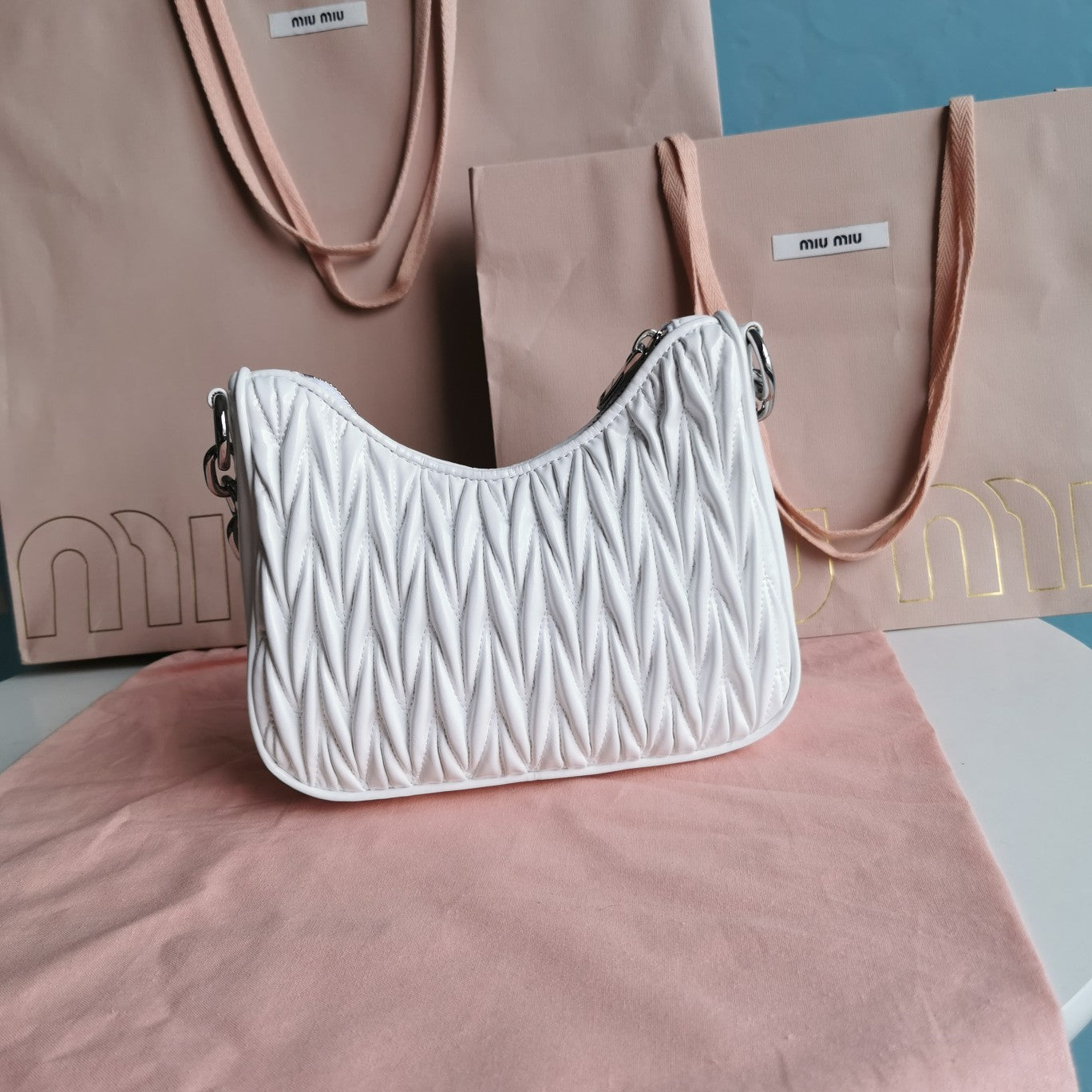 MIU MIU MATELASSé 21 BAG IN WHITE SATIN