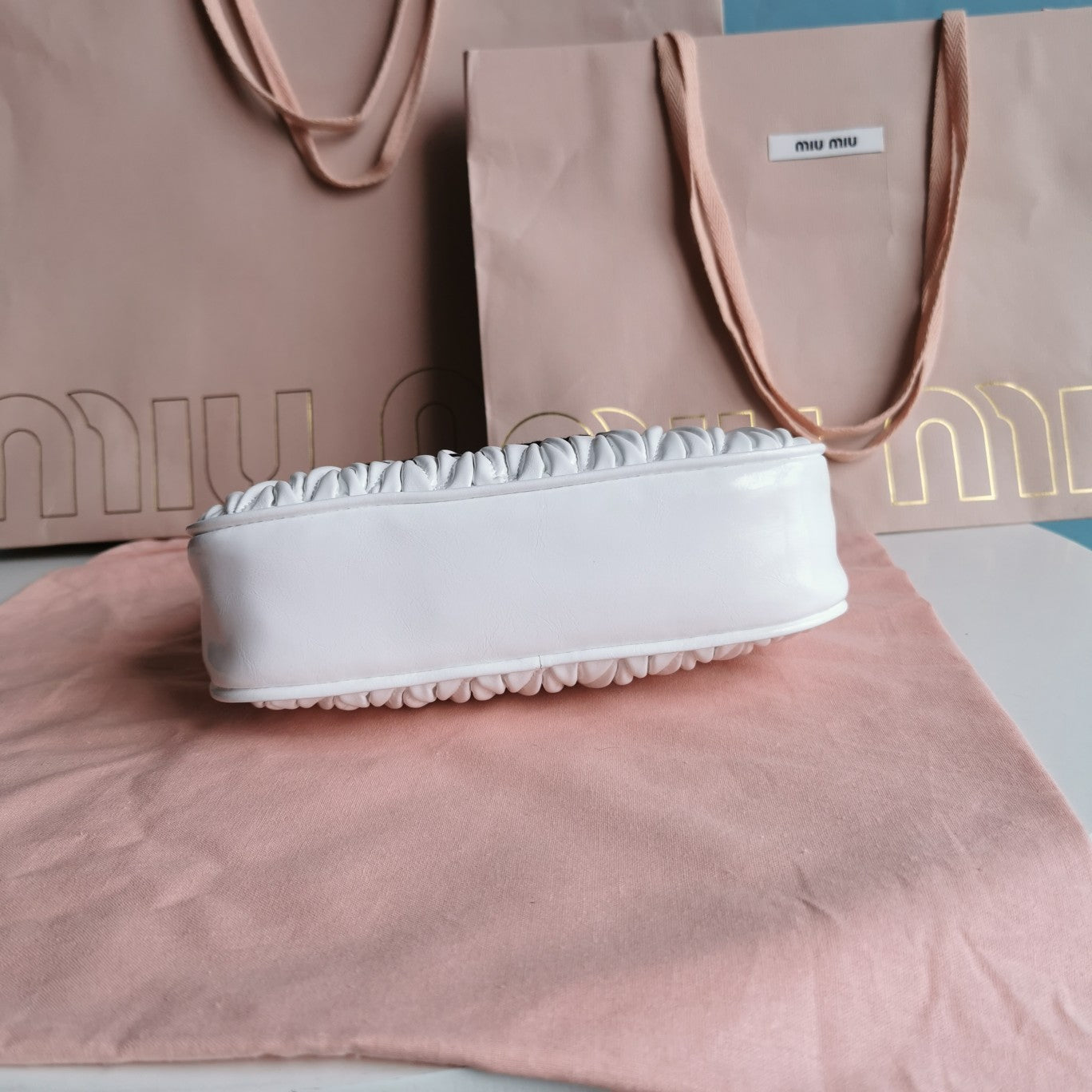 MIU MIU MATELASSé 21 BAG IN WHITE SATIN