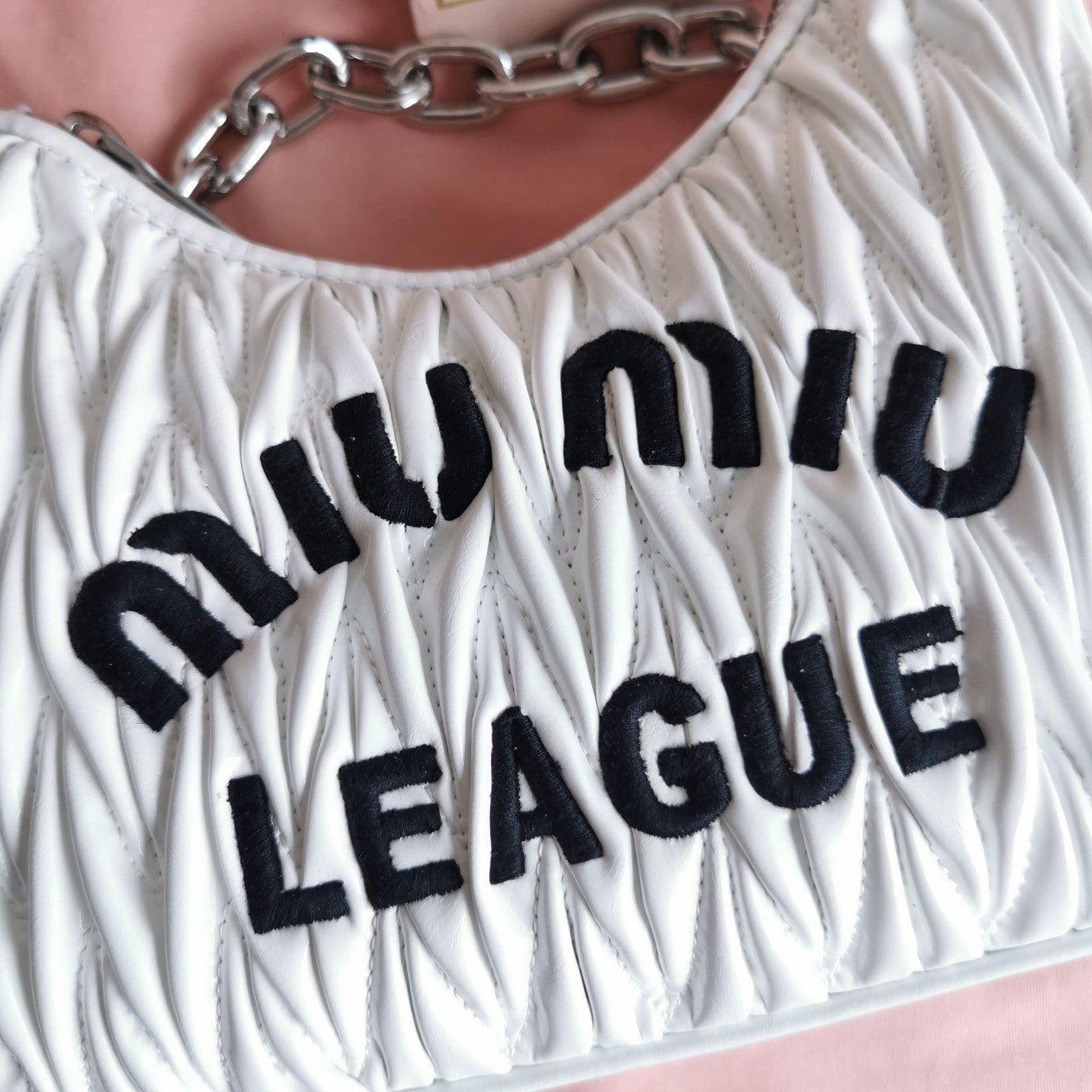 MIU MIU MATELASSé 21 BAG IN WHITE SATIN
