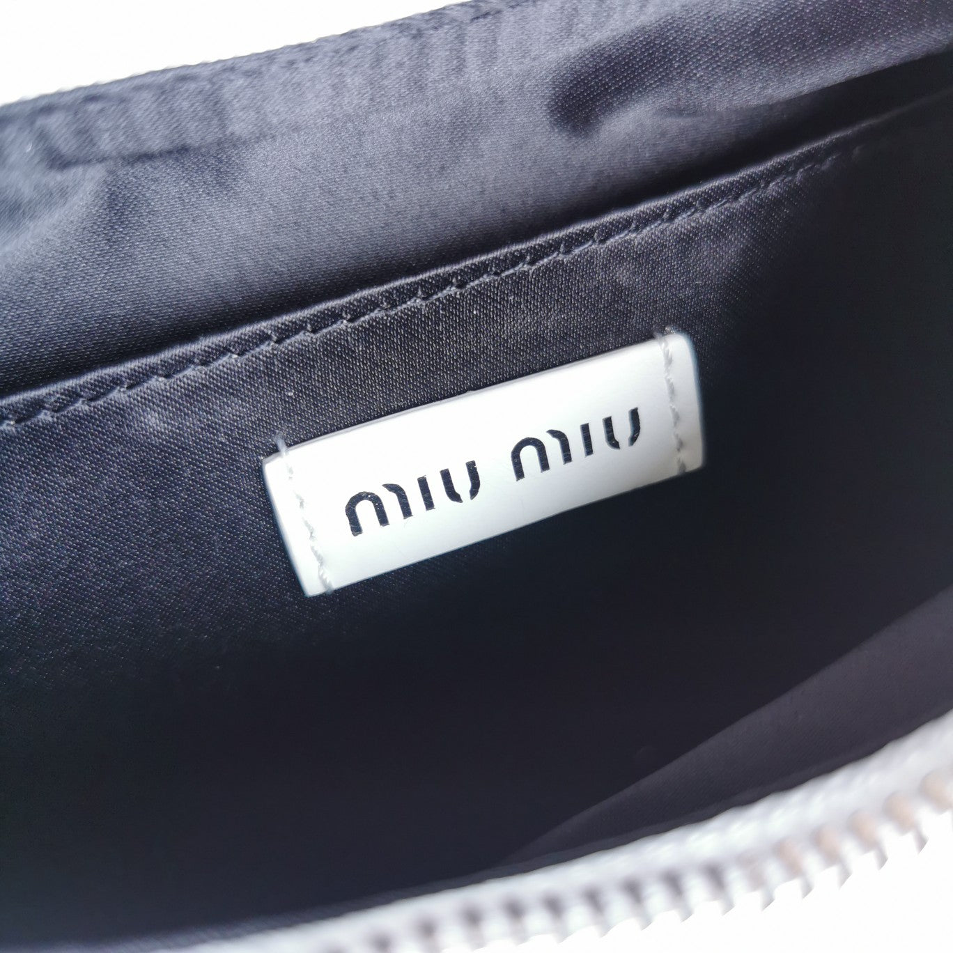 MIU MIU MATELASSé 21 BAG IN WHITE SATIN
