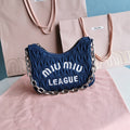 MIU MIU MATELASSé 21 BAG IN NAVY BLUE DENIM