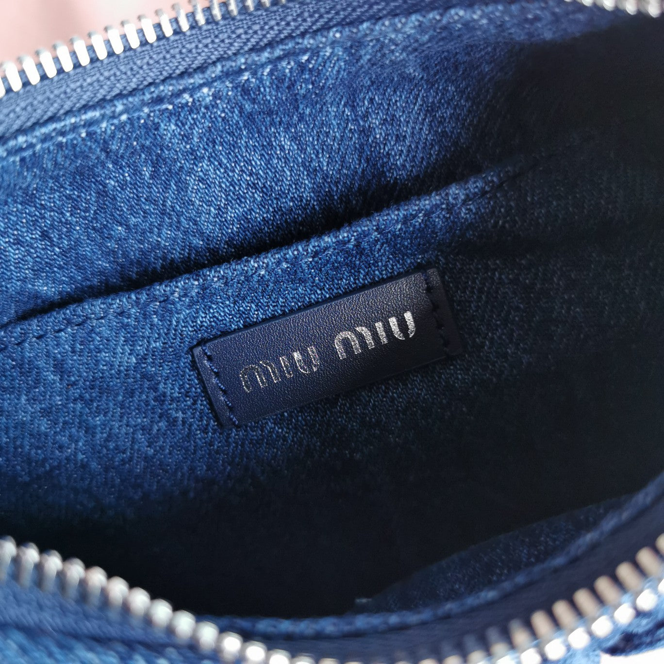 MIU MIU MATELASSé 21 BAG IN NAVY BLUE DENIM