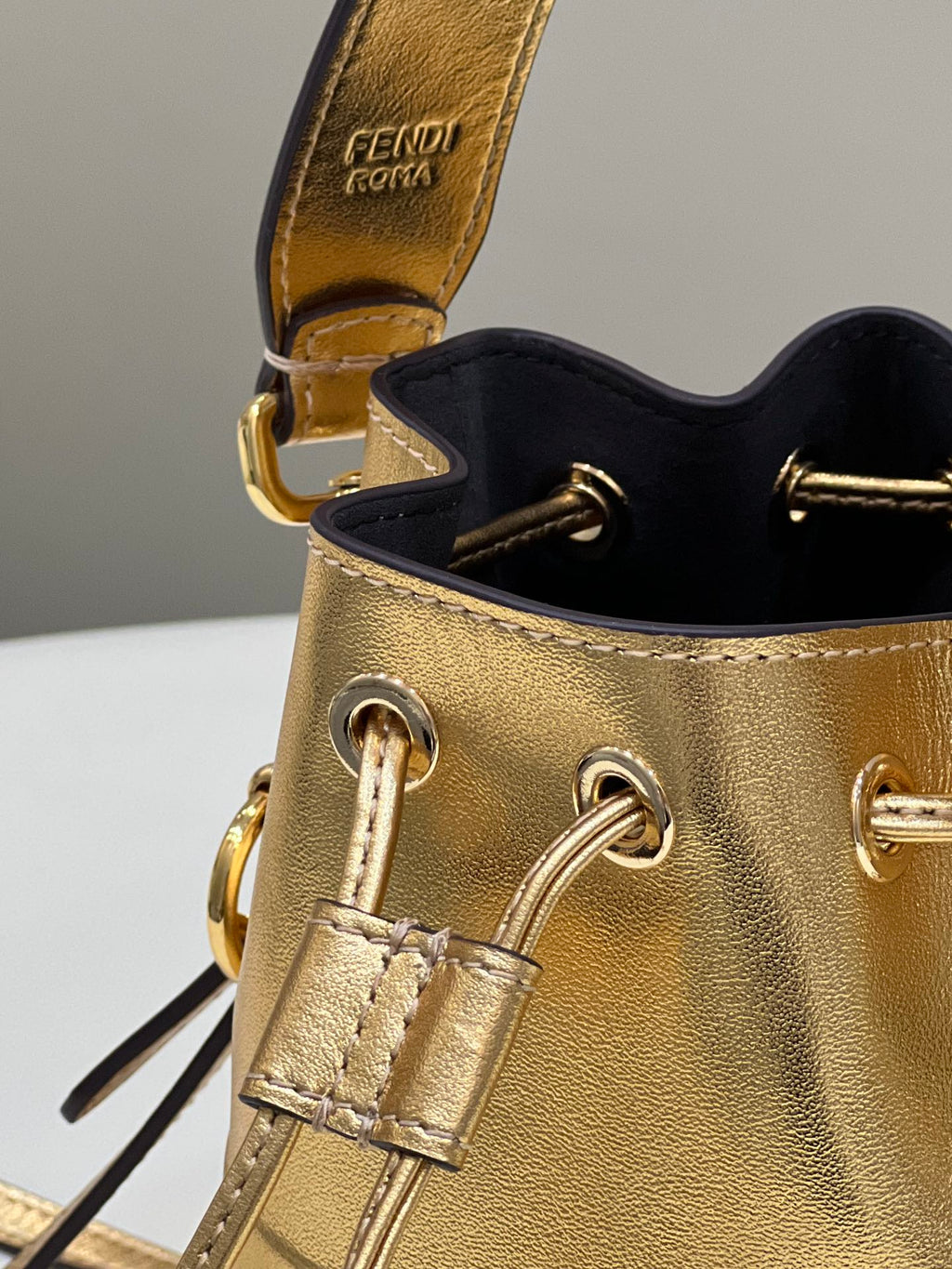FENDI MON TRESOR 18 IN GOLD METALLIC CALFSKIN