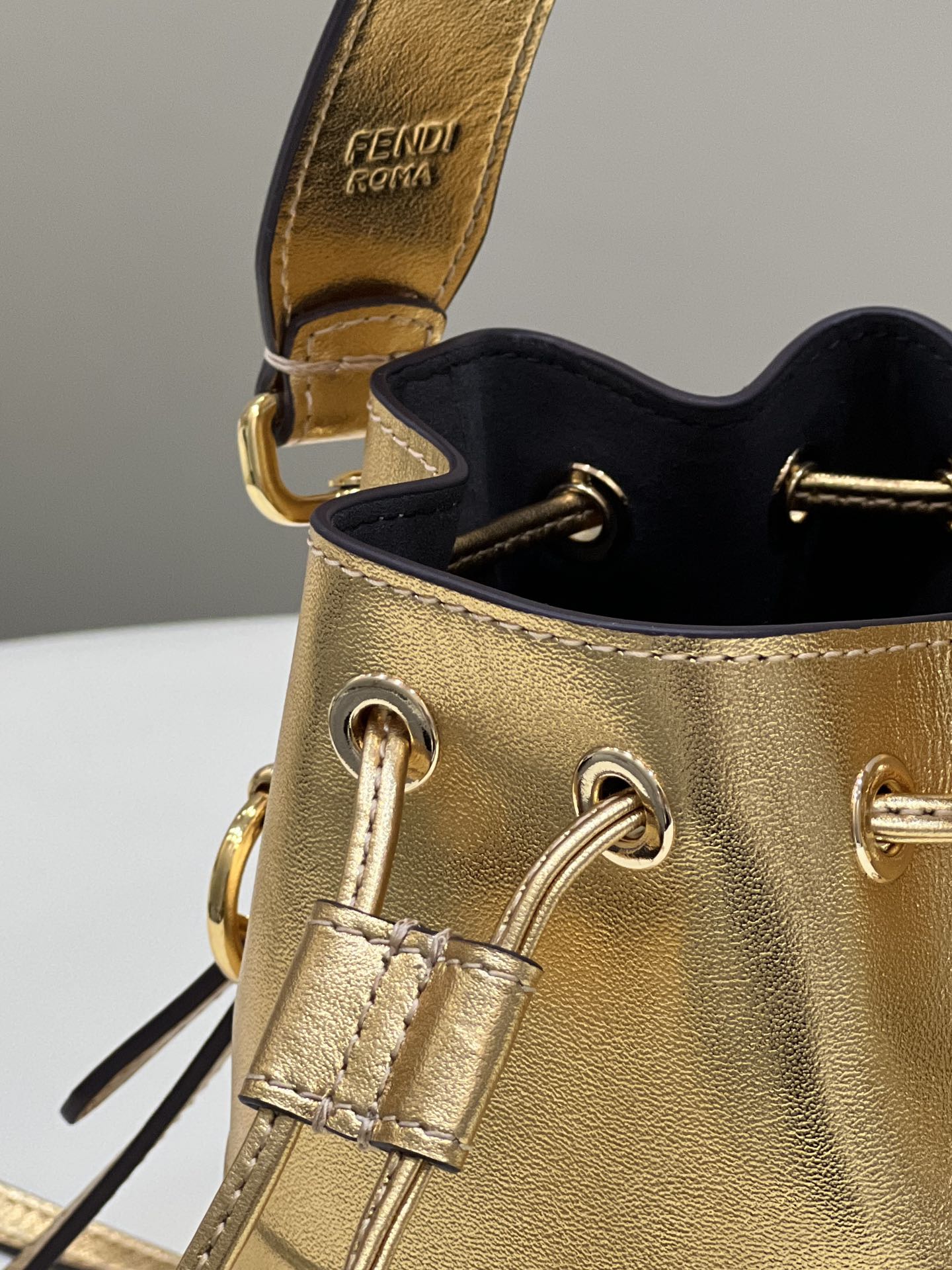 FENDI MON TRESOR 18 IN GOLD METALLIC CALFSKIN