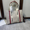 CHLOE MEDIUM STRAP WOODY TOTE BAG 37 IN BEIGE LINEN CANVAS BLACK WEBBING LOGO EMBROIDER RED CALFSKIN