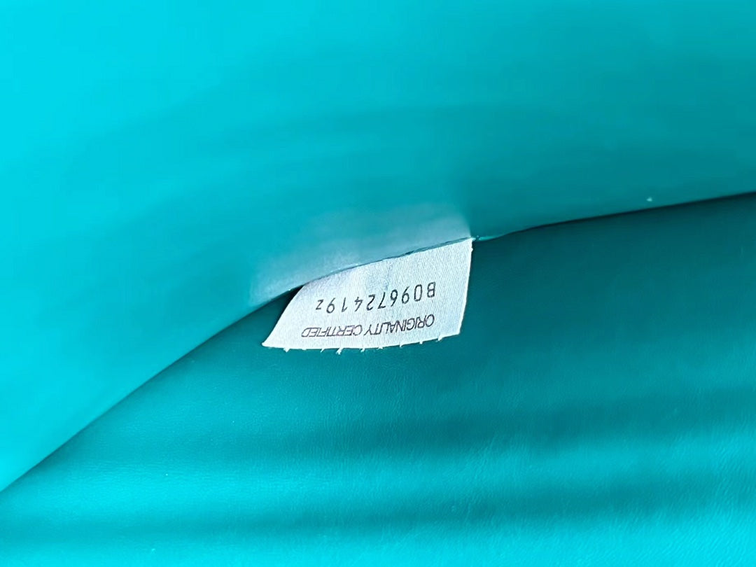 BOTTEGA VENETA LARGE CASSETTE POUCH 35 IN LAGOON BLUE CALFSKIN