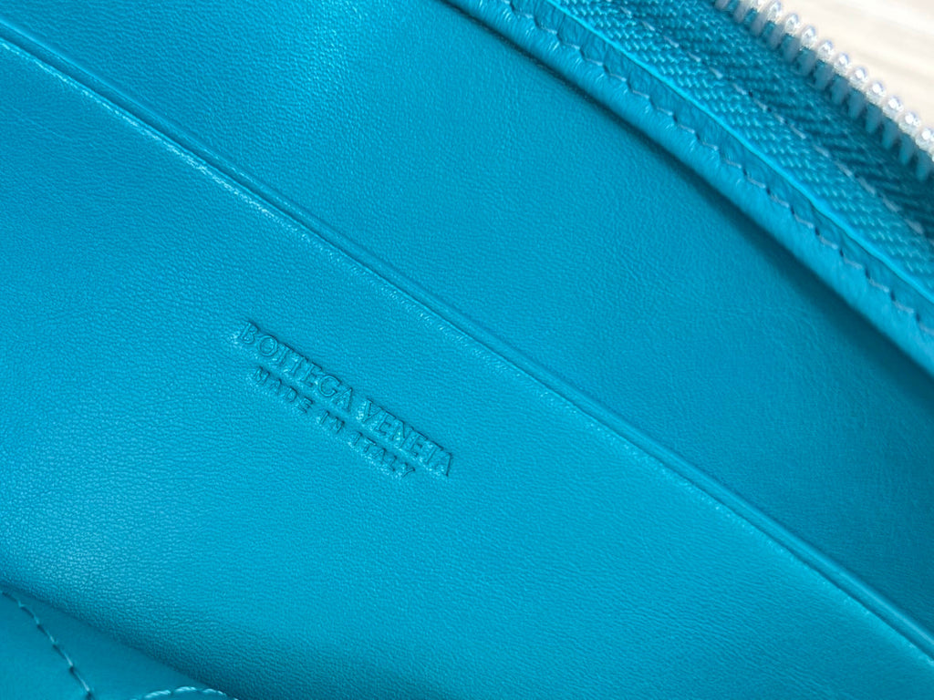 BOTTEGA VENETA LARGE CASSETTE POUCH 35 IN LAGOON BLUE CALFSKIN