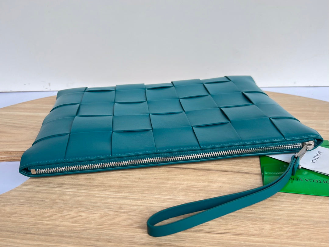 BOTTEGA VENETA LARGE CASSETTE POUCH 35 IN LAGOON BLUE CALFSKIN