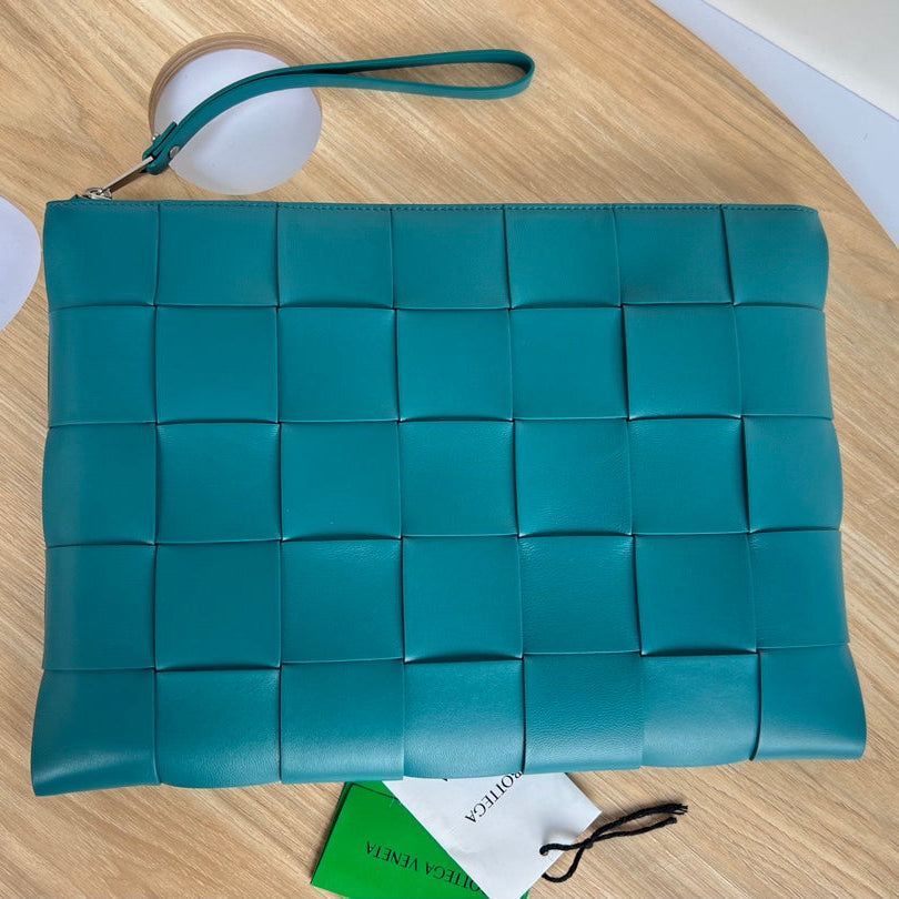 BOTTEGA VENETA LARGE CASSETTE POUCH 35 IN LAGOON BLUE CALFSKIN