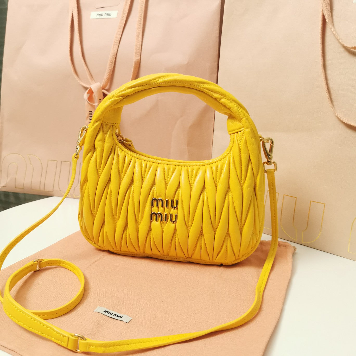 MIU MIU WANDER MATELASSÉ NAPPA HOBO BAG 23 IN YELLOW LAMBSKIN