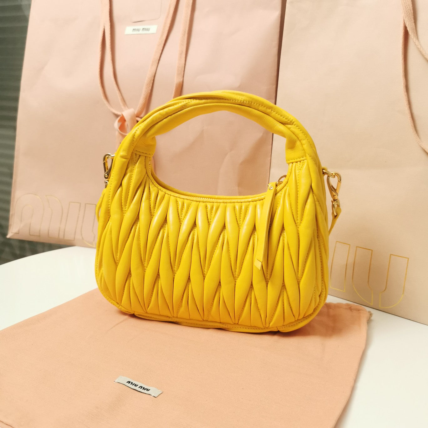 MIU MIU WANDER MATELASSÉ NAPPA HOBO BAG 23 IN YELLOW LAMBSKIN