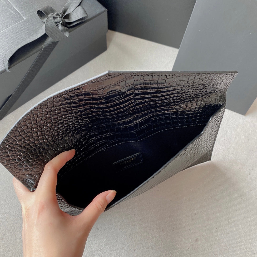 SAINT LAURENT UPTOWN POUCH 27 IN BLACK CROCODILE-EMBOSSED SHINY CALFSKIN GOLD LOGO