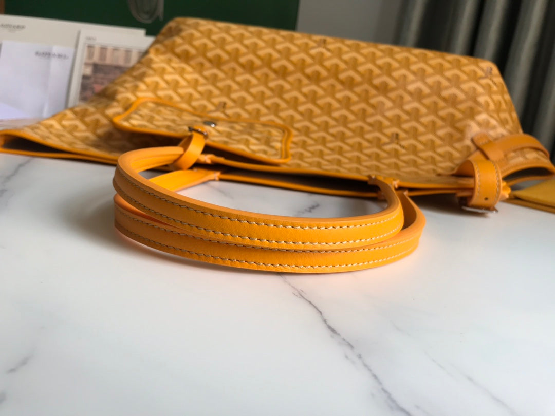 GOYARD CHIEN GRIS BAG 33 IN YELLOW GOYARDINE CANVAS AND CALFSKIN TRIM