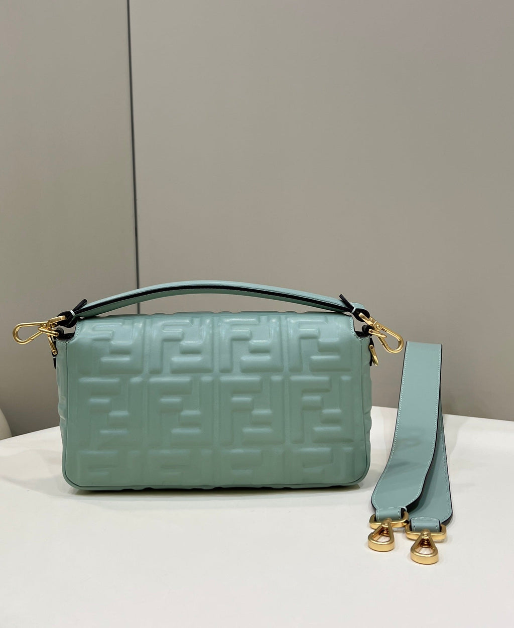 FENDI BAGUETTE WITH FF MOTIF 27 IN VIRIDIAN GREEN SOFT LAMBSKIN GOLD HARDWARE