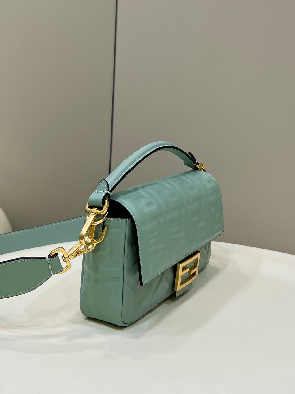 FENDI BAGUETTE WITH FF MOTIF 27 IN VIRIDIAN GREEN SOFT LAMBSKIN GOLD HARDWARE