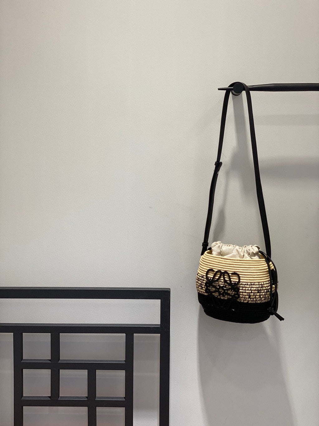 LOEWE LOE 18 ANAGRAM BASKET BAG IN BLACK AND NATURAL RAFFIA