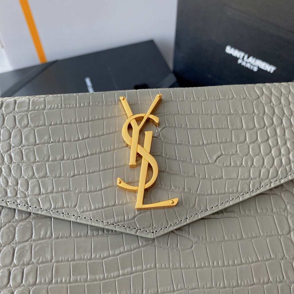 SAINT LAURENT UPTOWN POUCH 27 IN PASTEL GRAY CROCODILE-EMBOSSED SHINY CALFSKIN GOLD LOGO