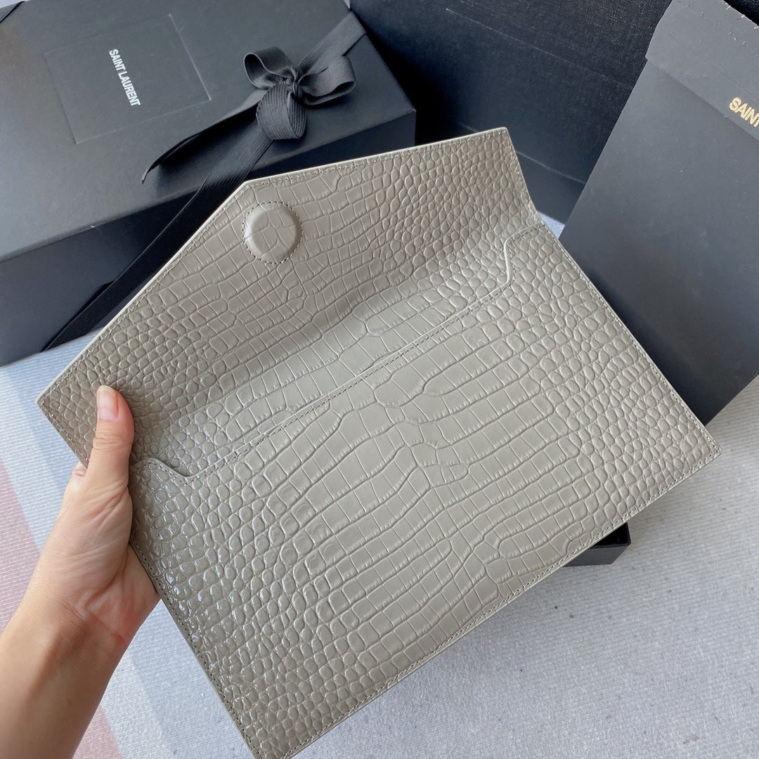 SAINT LAURENT UPTOWN POUCH 27 IN PASTEL GRAY CROCODILE-EMBOSSED SHINY CALFSKIN GOLD LOGO