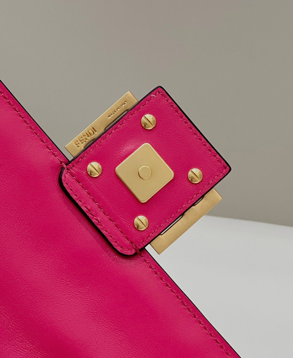 FENDI BAGUETTE WITH FF MOTIF 27 IN CERISH PINK SOFT LAMBSKIN GOLD HARDWARE