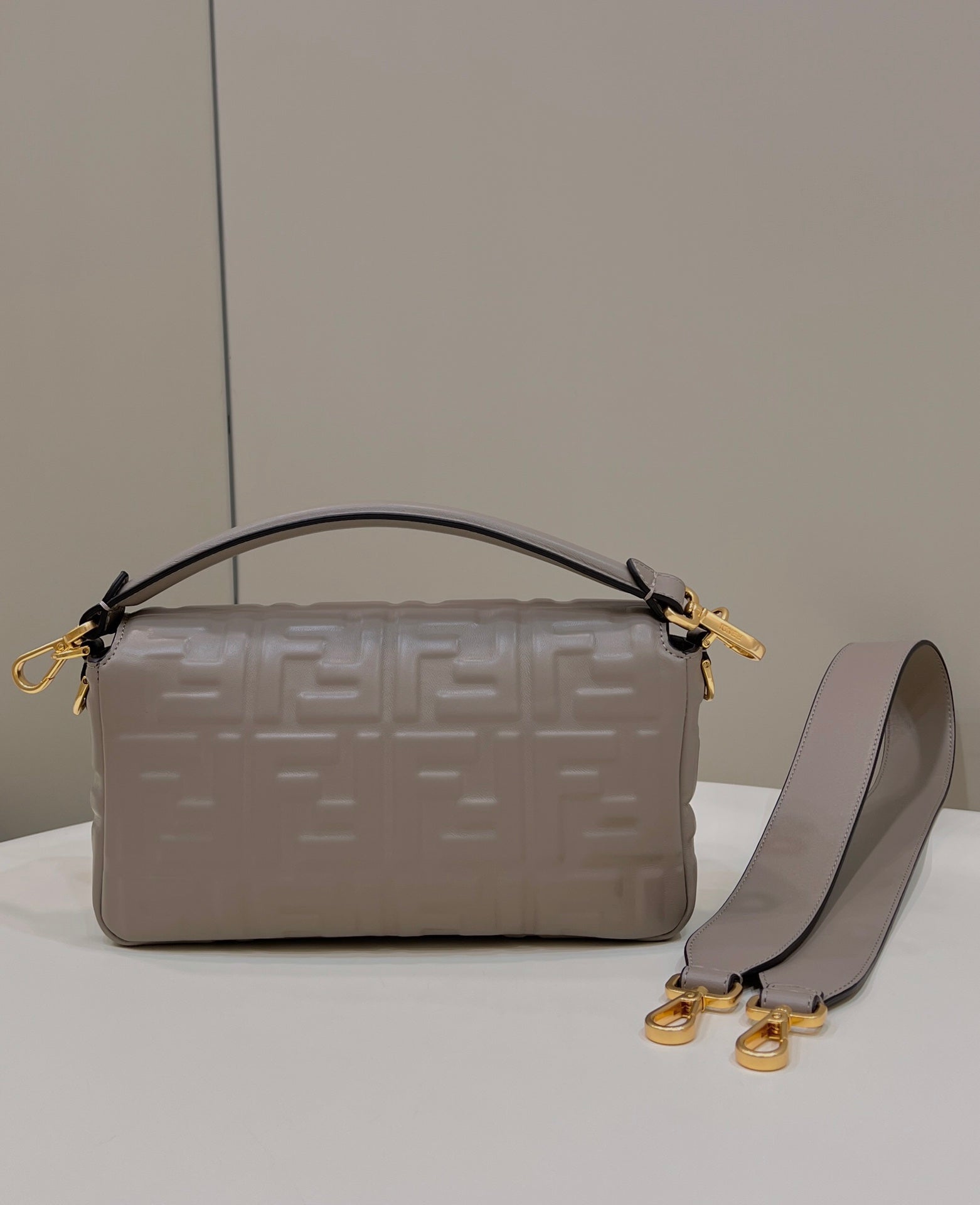 FENDI BAGUETTE WITH FF MOTIF 27 IN PINE CONE SOFT LAMBSKIN GOLD HARDWARE