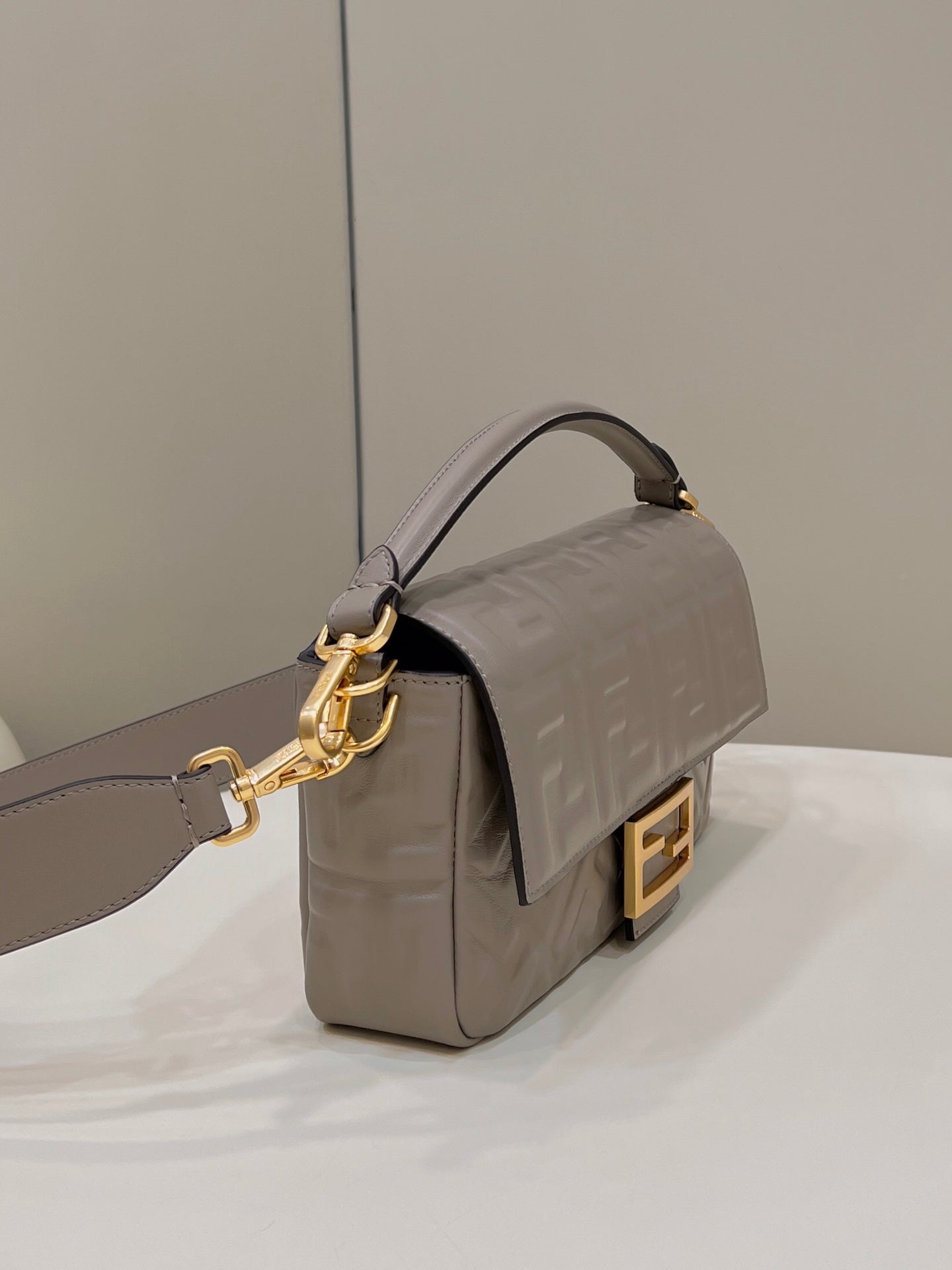 FENDI BAGUETTE WITH FF MOTIF 27 IN PINE CONE SOFT LAMBSKIN GOLD HARDWARE