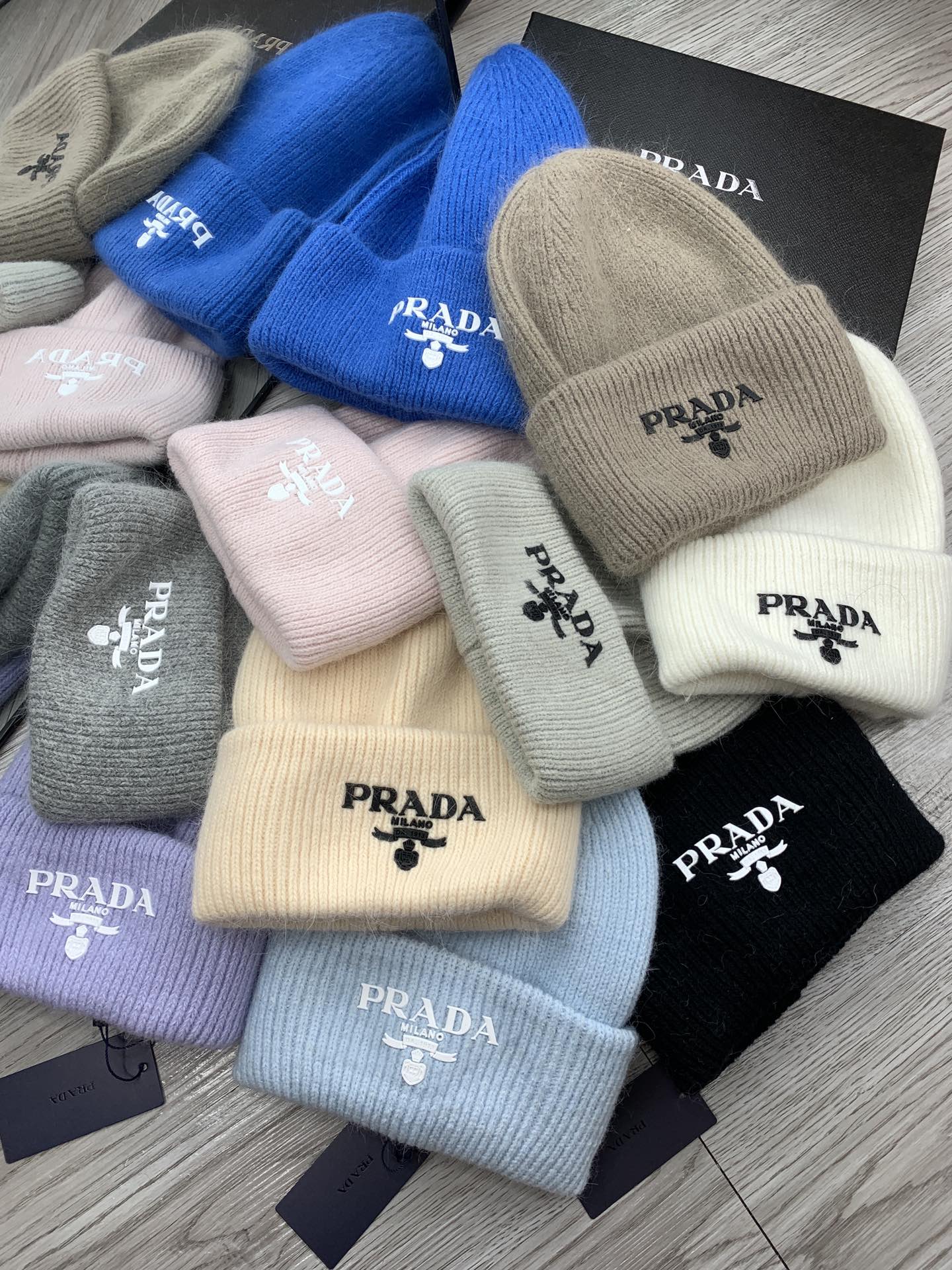 PRADA BEANIE HAT IN SOLF PINK WOOL 108751