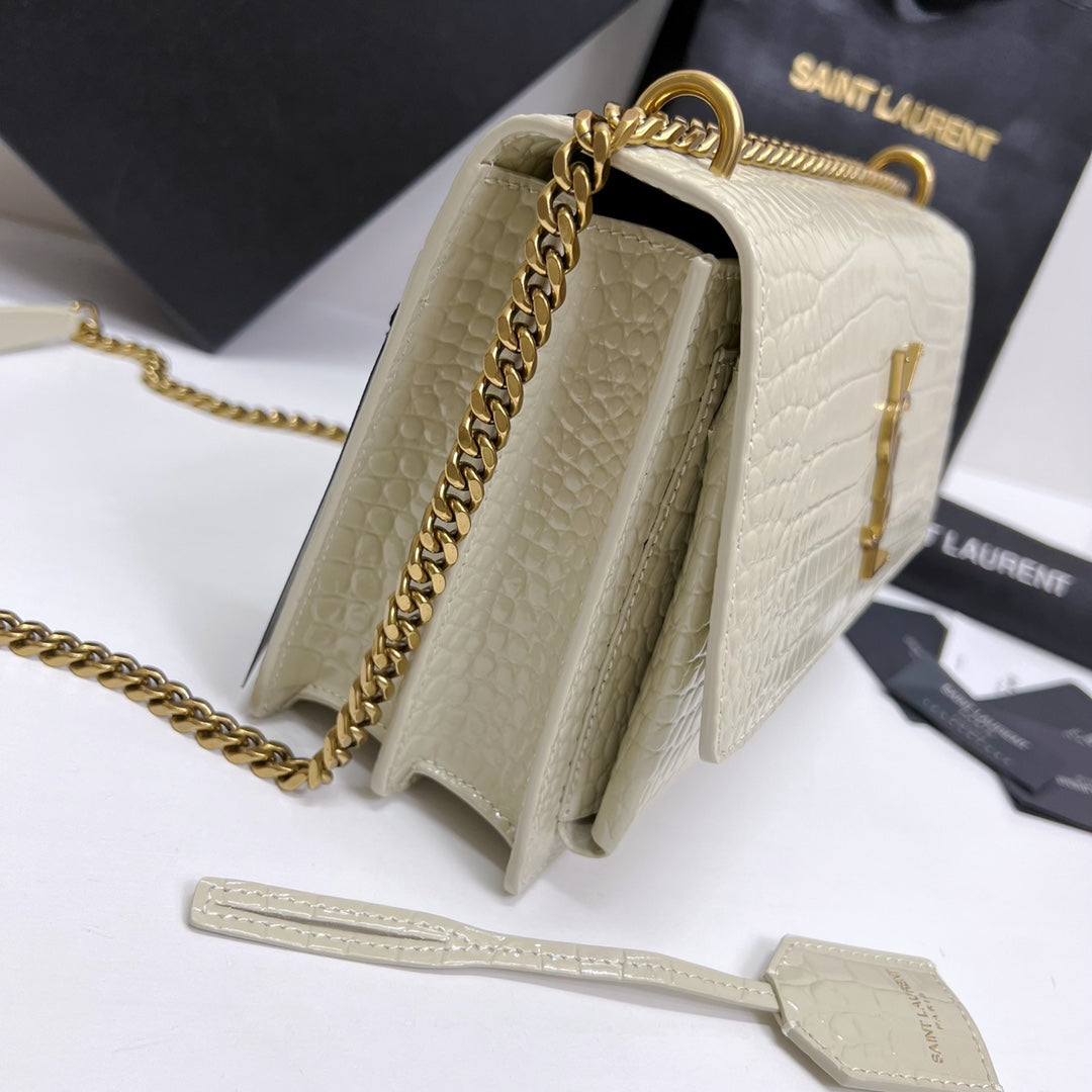 SAINT LAURENT SUNSET MEDIUM 22 IN WHITE CROCODILE PATTERN CALFSKIN GOLD HARDWARE