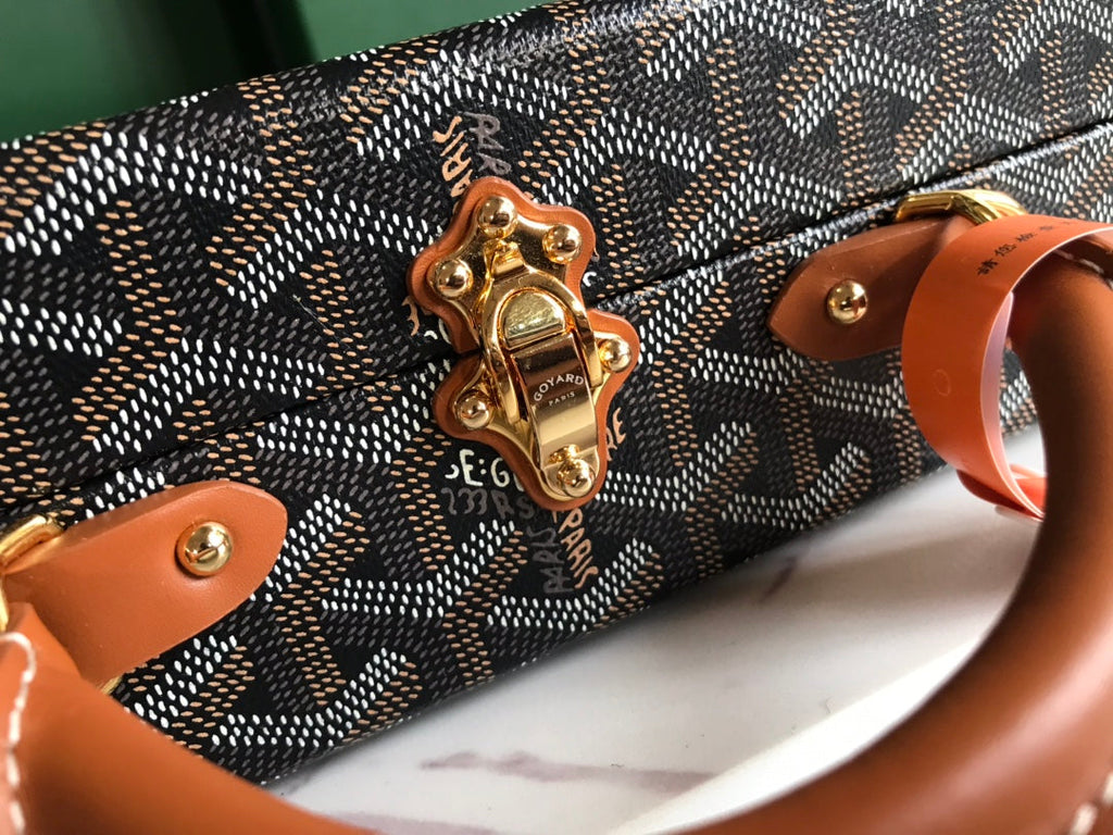 GOYARD GRAND HÔTEL TRUNK BAG 24 IN BLACK GOYARDINE CANVAS AND TAN CALFSKIN