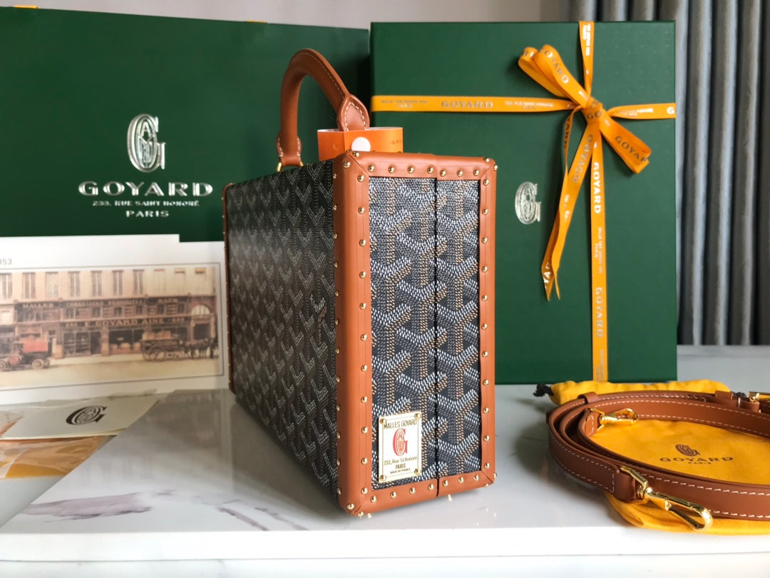 GOYARD GRAND HÔTEL TRUNK BAG 24 IN BLACK GOYARDINE CANVAS AND TAN CALFSKIN