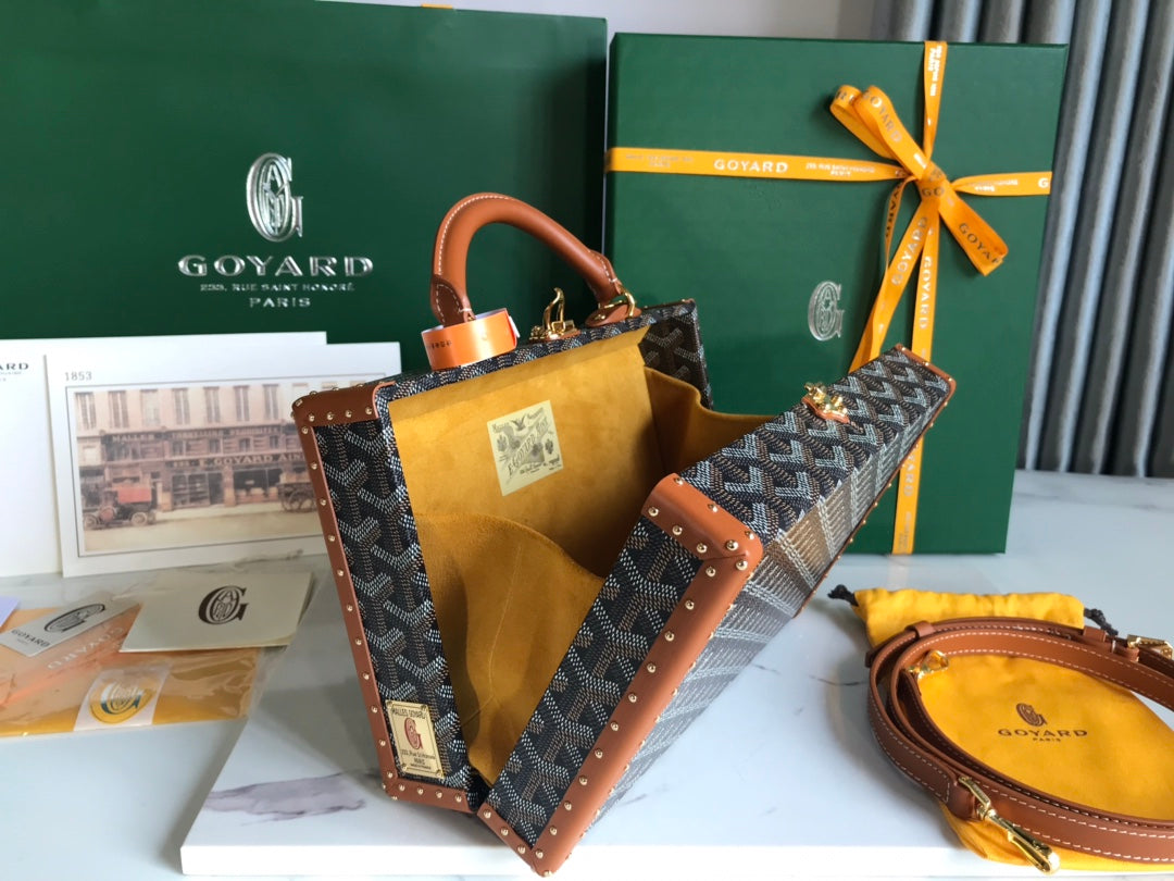 GOYARD GRAND HÔTEL TRUNK BAG 24 IN BLACK GOYARDINE CANVAS AND TAN CALFSKIN