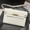 SAINT LAURENT MANHATTAN 29 TOP-HANDLE IN SMOOTH WHITE CALFSKIN