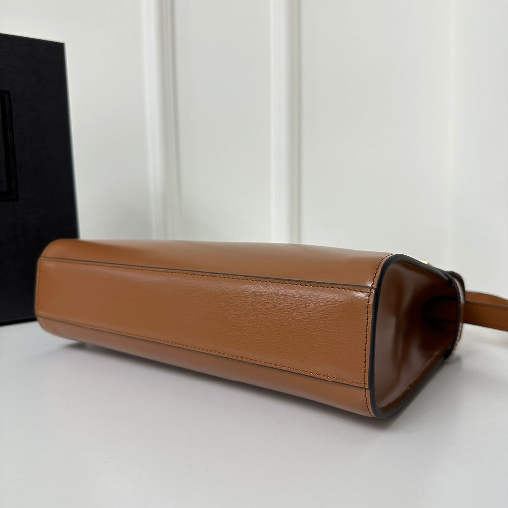 SAINT LAURENT MANHATTAN 29 TOP-HANDLE IN SMOOTH CINNAMON BROWN CALFSKIN