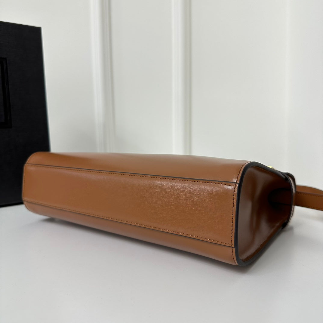 SAINT LAURENT MANHATTAN 29 TOP-HANDLE IN SMOOTH CINNAMON BROWN CALFSKIN