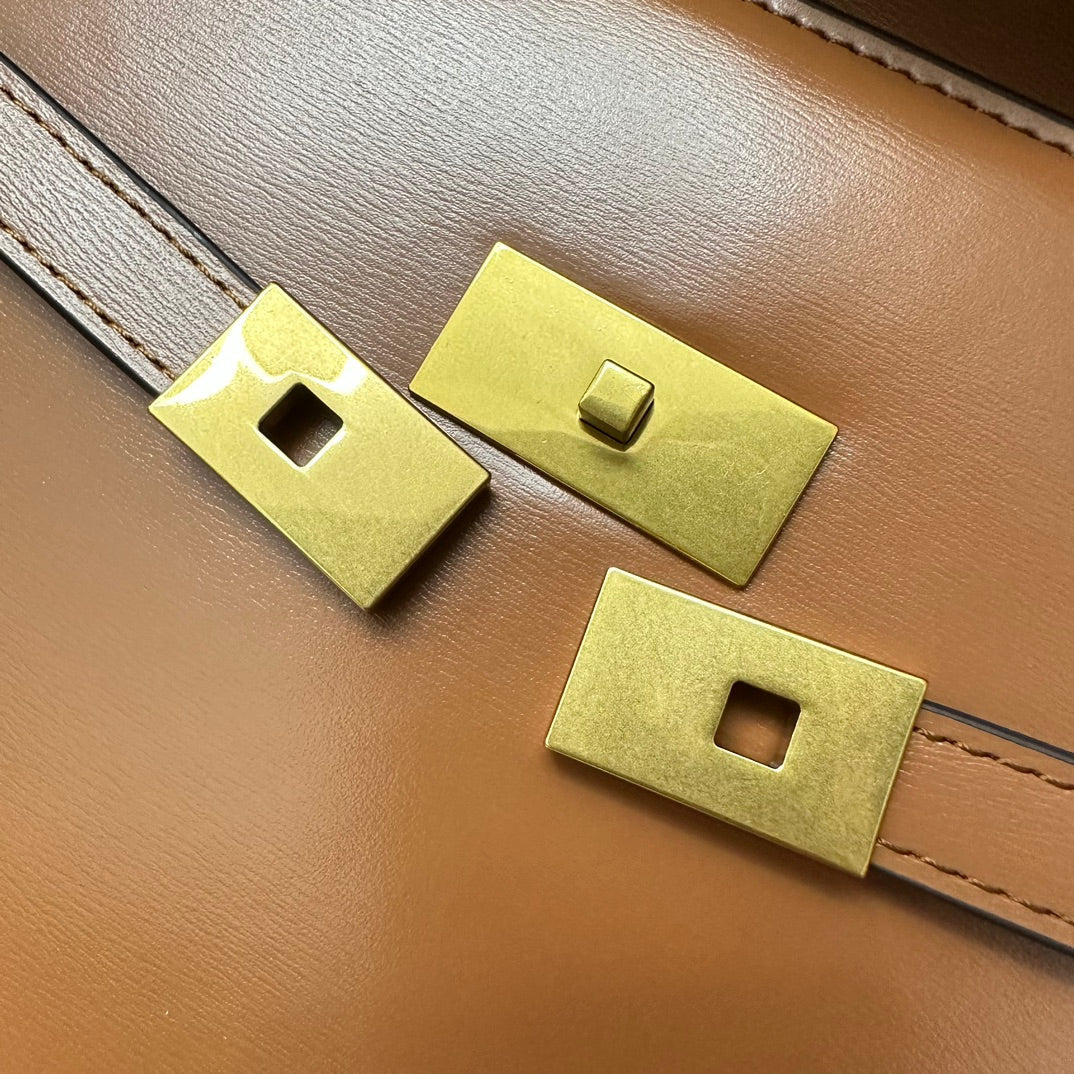 SAINT LAURENT MANHATTAN 29 TOP-HANDLE IN SMOOTH CINNAMON BROWN CALFSKIN