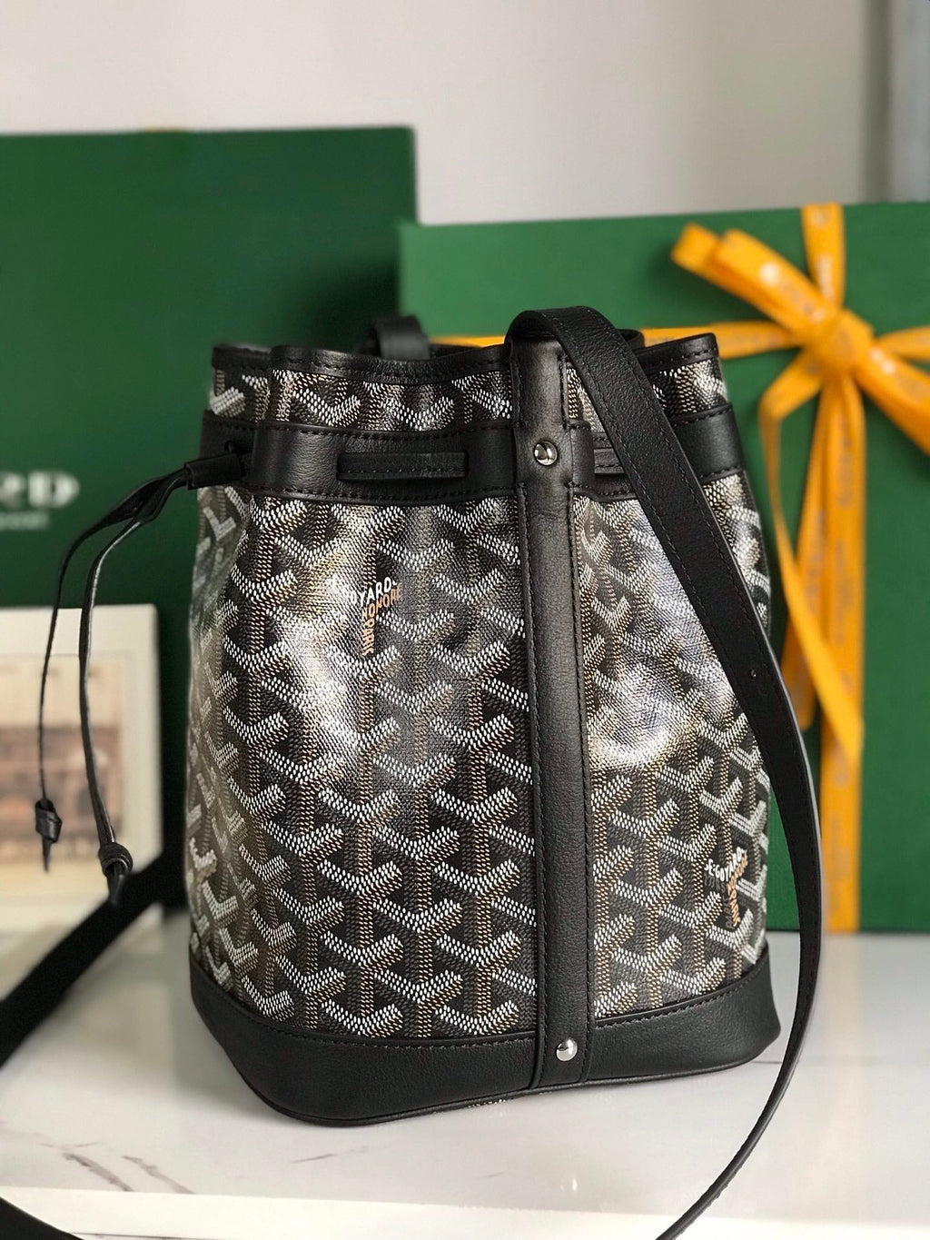 GOYARD PETIT FLOT BUCKET BAG 22 IN BLACK GOYARDINE CANVAS AND LAMBSKIN TRIM