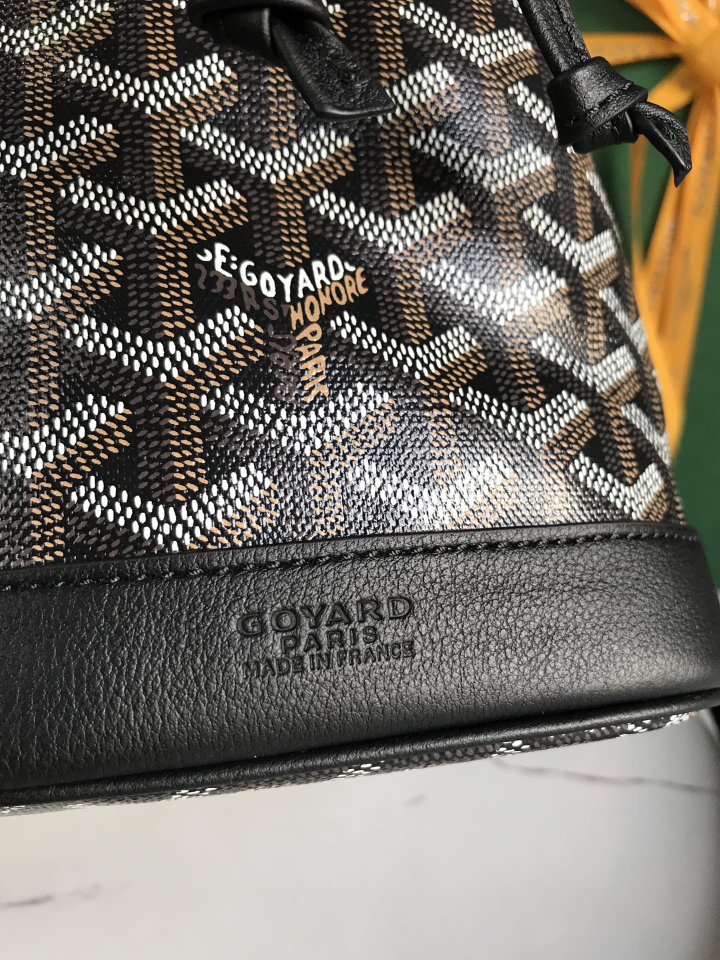 GOYARD PETIT FLOT BUCKET BAG 22 IN BLACK GOYARDINE CANVAS AND LAMBSKIN TRIM