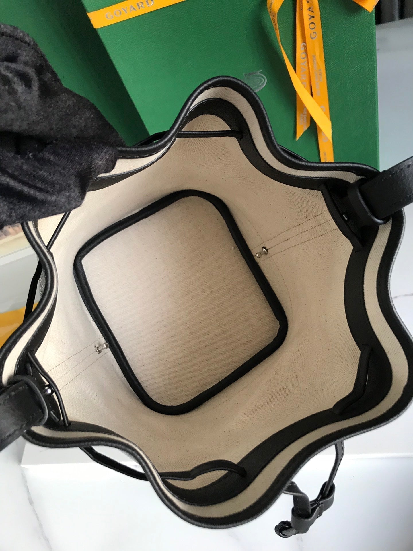 GOYARD PETIT FLOT BUCKET BAG 22 IN BLACK GOYARDINE CANVAS AND LAMBSKIN TRIM