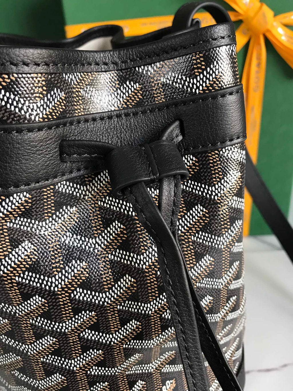 GOYARD PETIT FLOT BUCKET BAG 22 IN BLACK GOYARDINE CANVAS AND LAMBSKIN TRIM