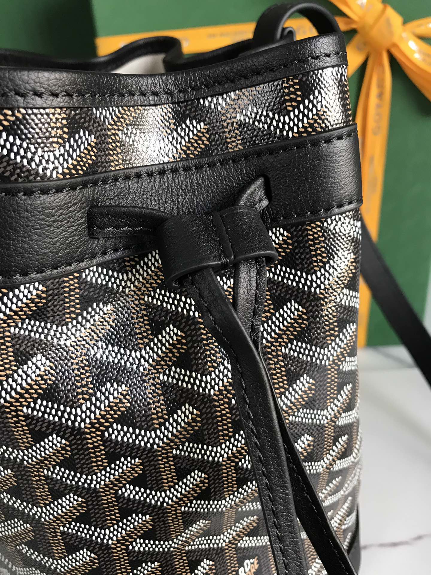 GOYARD PETIT FLOT BUCKET BAG 22 IN BLACK GOYARDINE CANVAS AND LAMBSKIN TRIM