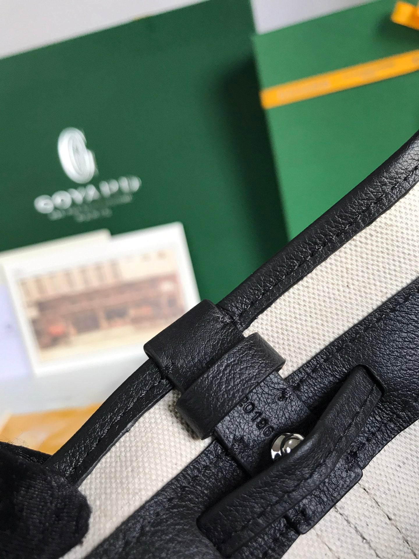 GOYARD PETIT FLOT BUCKET BAG 22 IN BLACK GOYARDINE CANVAS AND LAMBSKIN TRIM