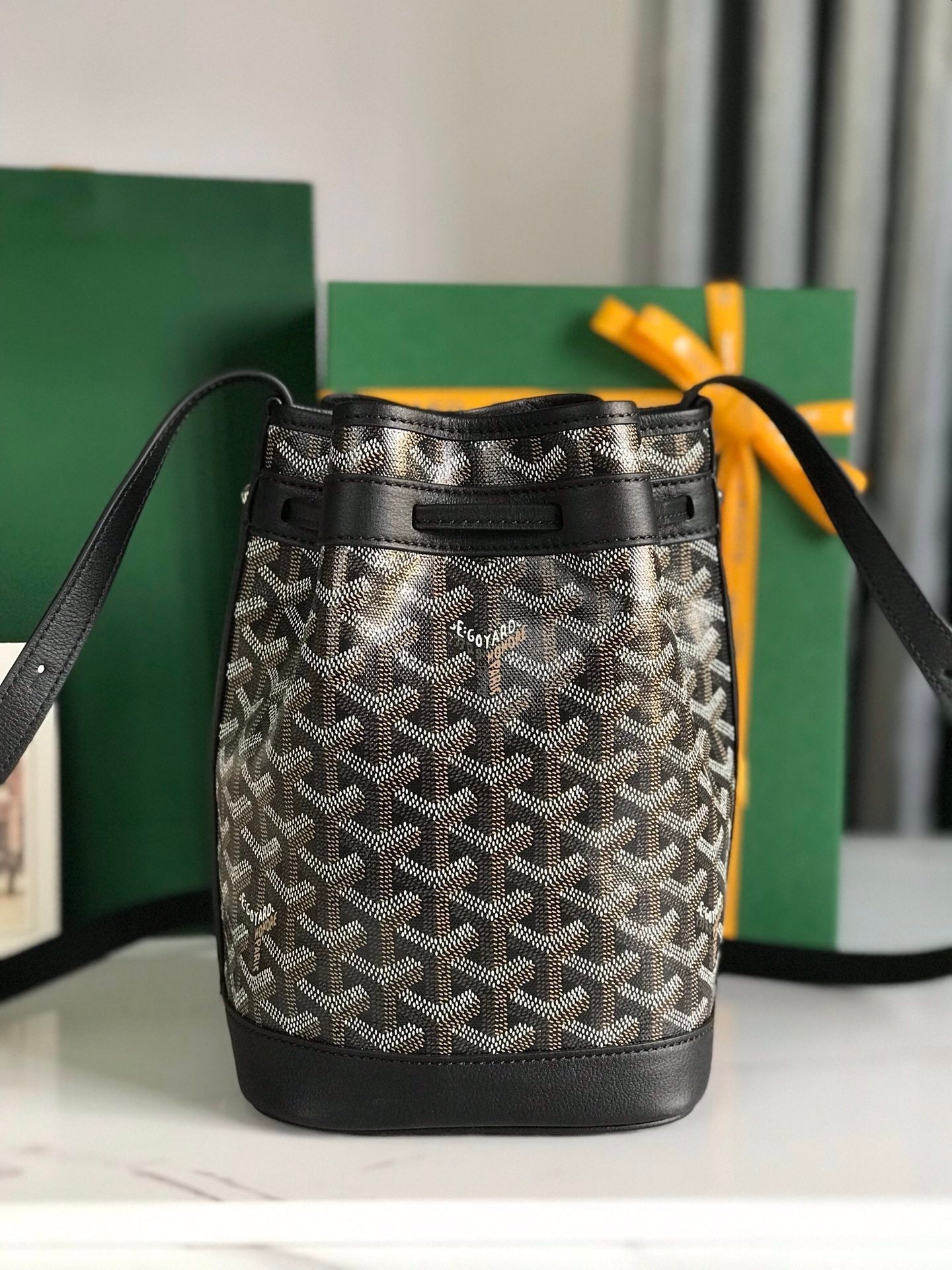 GOYARD PETIT FLOT BUCKET BAG 22 IN BLACK GOYARDINE CANVAS AND LAMBSKIN TRIM