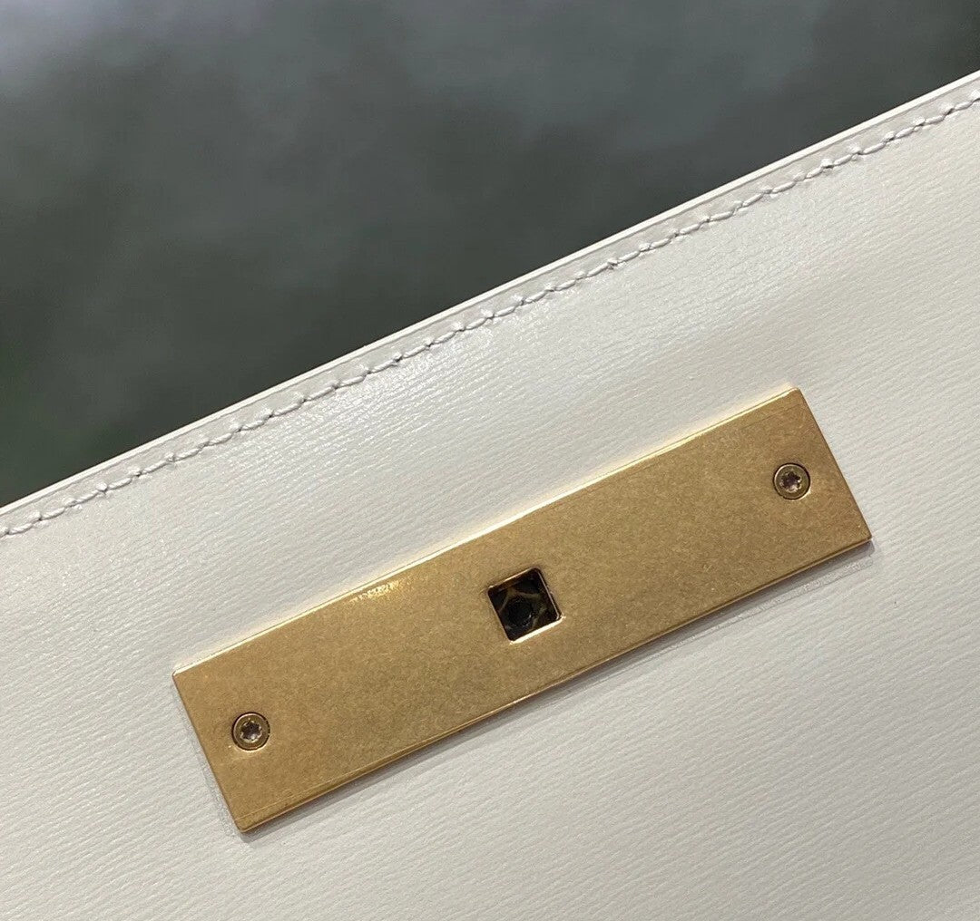 SAINT LAURENT MANHATTAN 29 TOP-HANDLE IN SMOOTH WHITE CALFSKIN